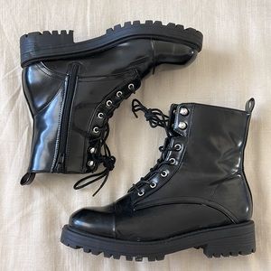 patent black combat boots.